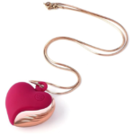 Tracy's Dog Heart Necklace Vibe – Rechargeable 2-in-1 jewelry massager in elegant Rose Gold and Red, perfect for relaxation and style.